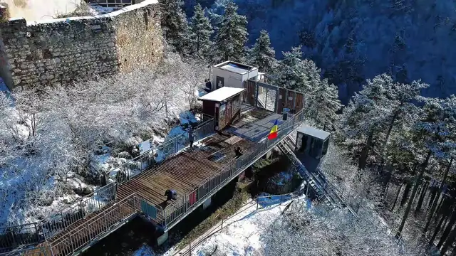 The upper station and the platform under snow